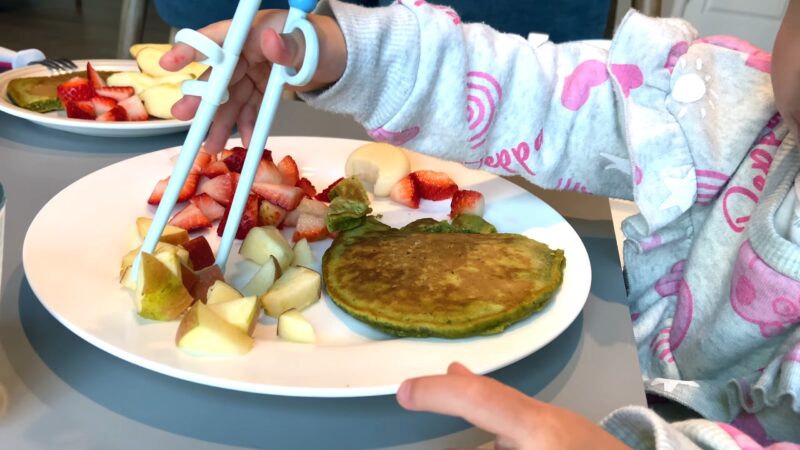 Children practice of using chopsticks